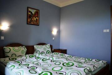 Фото номера Дом с 5 спальнями Гостевой дом Sichanova Guest House г. Brŭchkovtsi 11