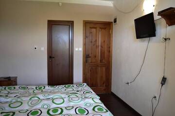 Фото номера Дом с 5 спальнями Гостевой дом Sichanova Guest House г. Brŭchkovtsi 21