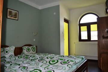 Фото номера Дом с 5 спальнями Гостевой дом Sichanova Guest House г. Brŭchkovtsi 22
